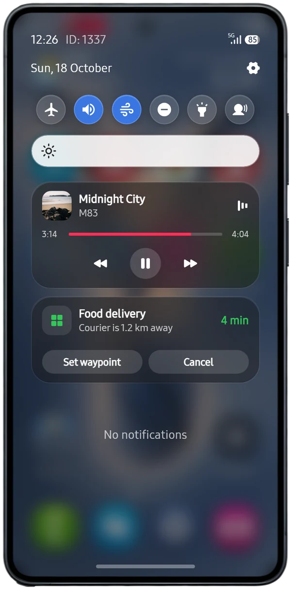 Humanoid Y26 notification shade with a media card for Midnight City by M83 and a Food delivery card with Set waypoint and Cancel buttons.